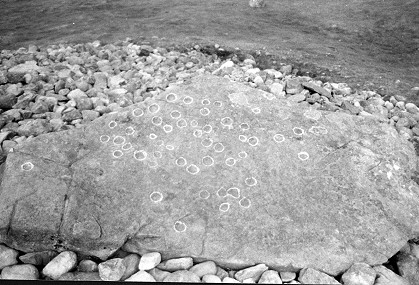 Corrimony - cupmarks on capstone