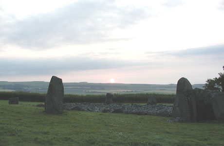 Loanhead of Daviot recumbent stone circle, sunrise close to summer solstice. Copyright Ken Gordon